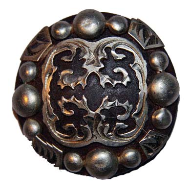 Bruin staal concho met zilver engravement