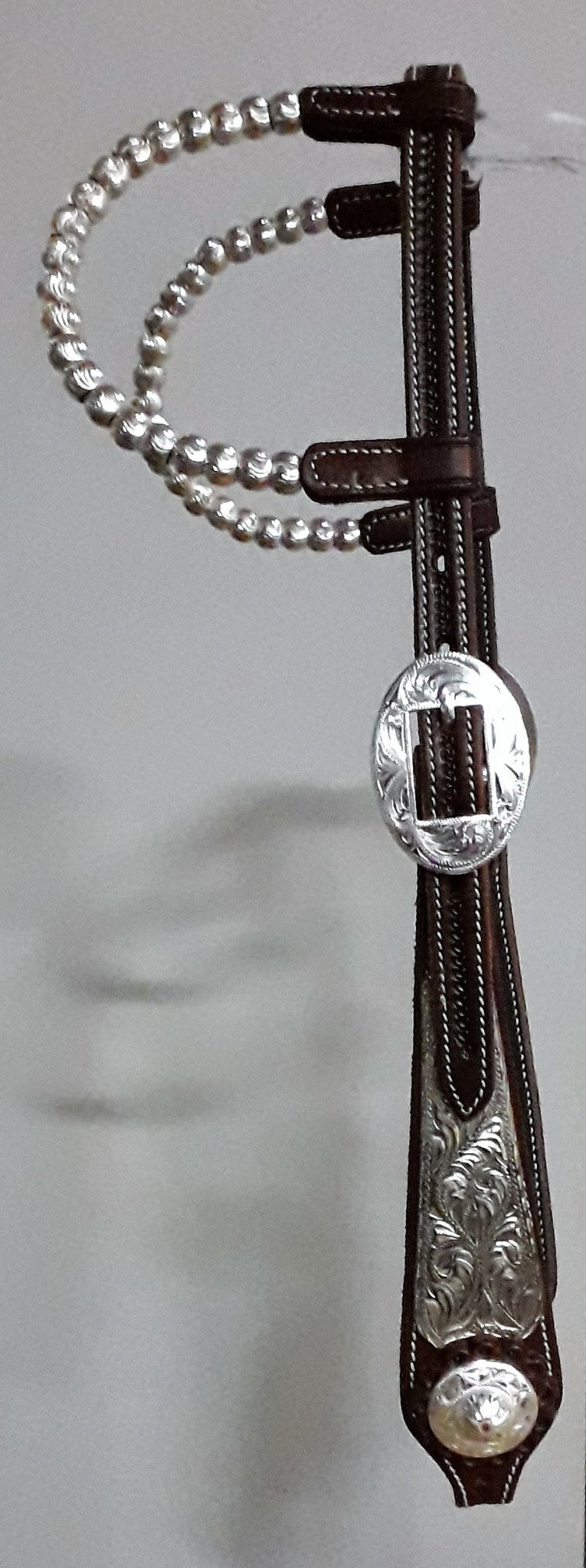 CLICK HERE to see some examples of hoofdstels met zilver and “bling” !!